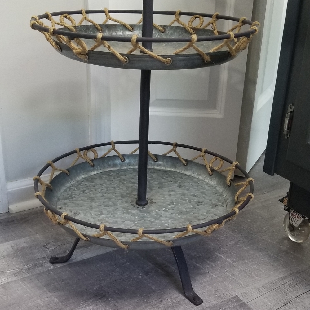Metal, wrought iron and burlap tier stand. Can be used for serving,other decor.